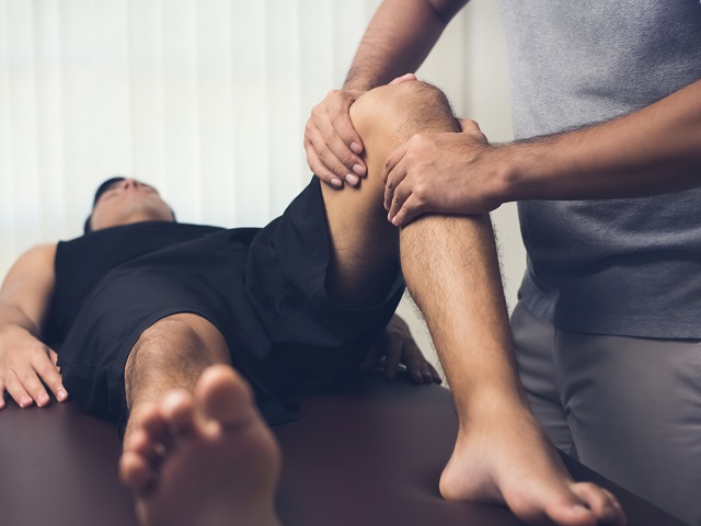 Physio pic male on treatment bed